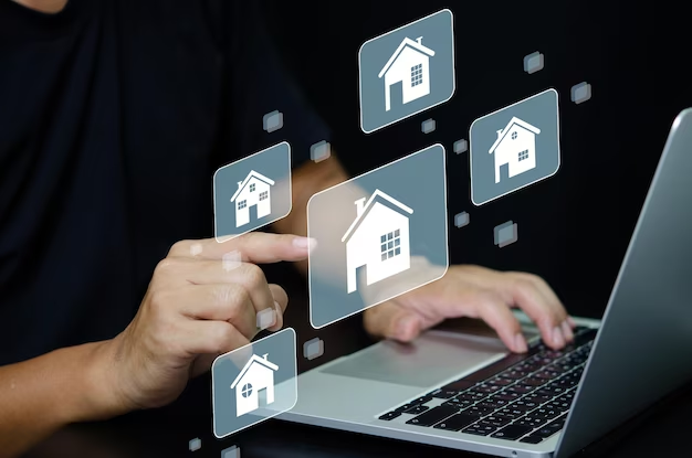 User using laptop tapping floating house icon